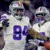 Dallas Cowboys defensive end Marshawn Kneeland (94) celebrates recovering a blocked punt for a touchdown during the game against the Arizona Cardinals