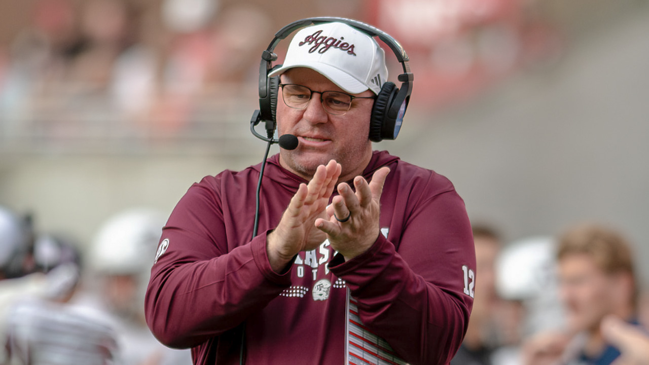 Texas A&M coach Mike Elko on the sidelines against Arkansas